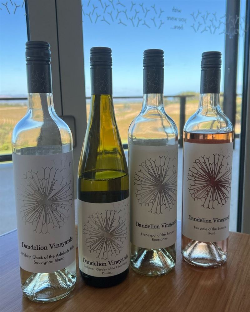 Dandelion Vineyards wines lined up by the cellar door window